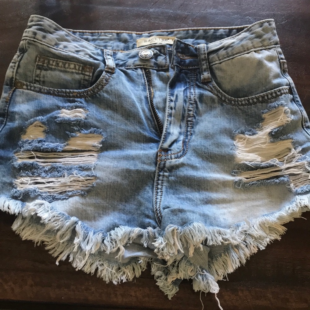 Distressed light denim shorts